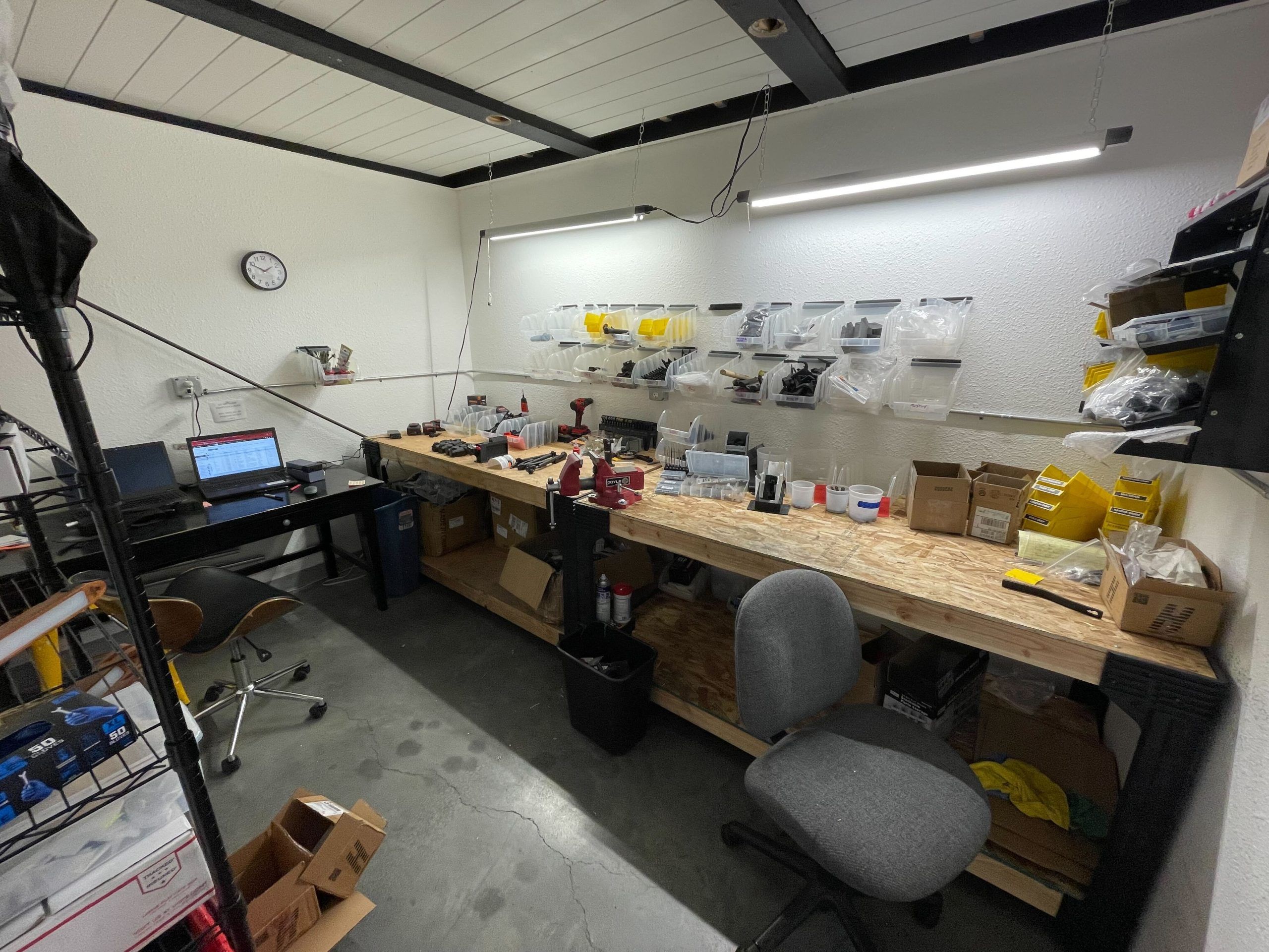 a workbench with a chair